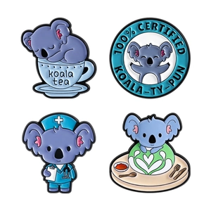 Cute koala enamel pin set featuring nurse koala and koala tea puns in blue metal