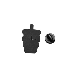 Detail of coffee cup shaped enamel pin back with black rubber clutch on white background