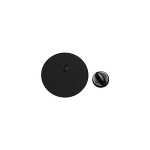Detailed back view of a round black enamel pin showing the metal needle and butterfly clutch