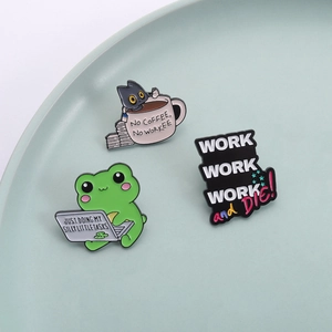 Whimsical enamel pins set featuring a cat in a coffee cup and a frog using a laptop