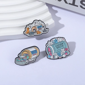 Three-piece serotonin booster enamel pins set featuring cat and book themes on white stand