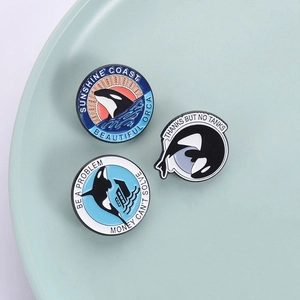Orca whale enamel brooch set featuring ocean motifs and sunshine coast slogans