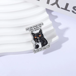 Black cat enamel pin with funny quote on a white corrugated display board