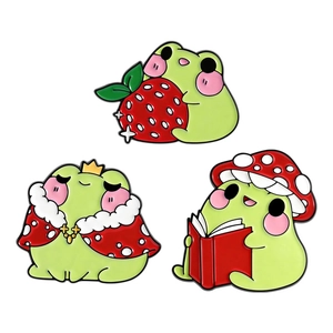 Three-piece cute frog enamel pin set with strawberry mushroom and crown king designs