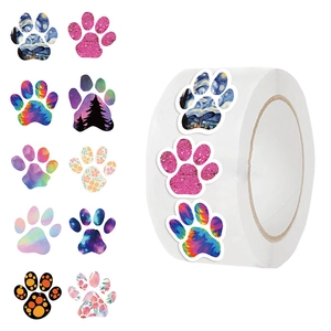 Roll of 500 waterproof paw print stickers with artistic patterns for scrapbooking