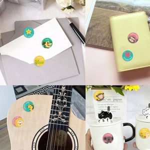 Diverse scenes showing colorful cartoon animal reward stickers on envelopes and notebooks