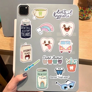 Dental cartoon stickers on laptop featuring fun tooth characters and dental assistant slogans