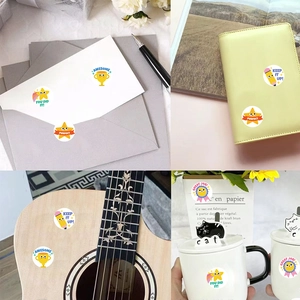 Roll of 500 cartoon star reward stickers for kids featuring colorful goal motivation designs