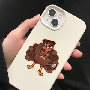 Close-up of a cream white detective turkey cartoon phone case held in hand