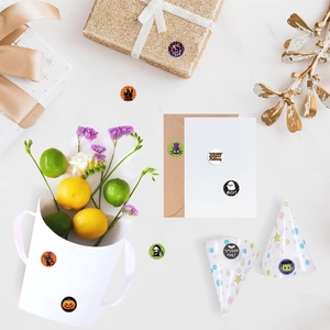 500pcs Halloween stickers roll with pumpkin, ghost, and cat patterns for gift sealing