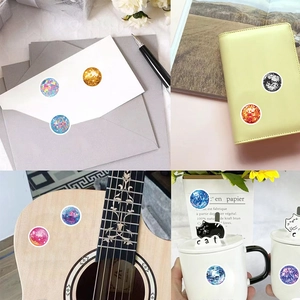 Roll of colorful disco ball stickers with shimmering mirror textures for DIY decoration