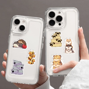 Close-up of waterproof cartoon animal stickers applied on a transparent phone case