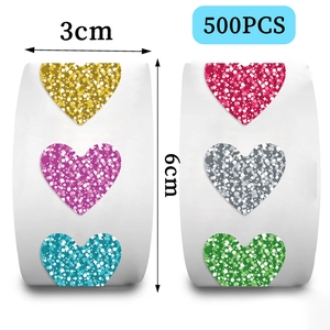 Roll of 500 heart-shaped glitter stickers in vibrant colors for gifts and sealing