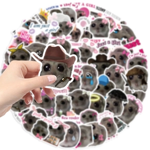 Close-up of a waterproof sad hamster meme sticker with a cowboy hat for laptop DIY