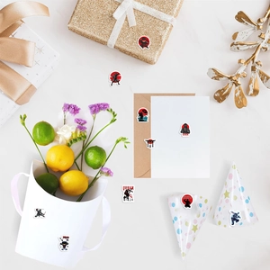Pegatinas ninja en cajas de regalo y sobres para decoración creativa y fiestas