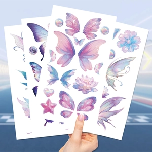 Close-up of butterfly and flower tattoo stickers with soft watercolor hand-drawn style
