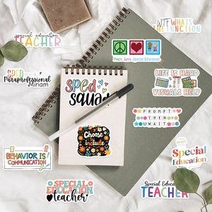 Flat lay of colorful waterproof special education stickers on a notebook with accessories
