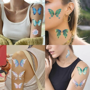 Waterproof temporary tattoos featuring blue butterfly and floral designs on skin