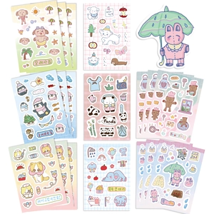 Flat lay of colorful cartoon animal stickers for DIY planners and phone case decoration