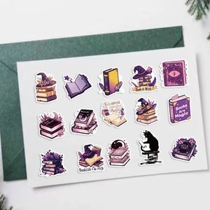 Detailed view of waterproof witchy book stickers with magic books and crystal ball designs