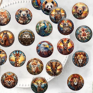 Waterproof PET stickers with colorful stained glass animal patterns on a white tray