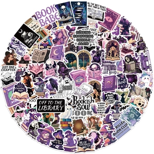 Close-up of waterproof dark academia witch stickers with book and magic cat themes