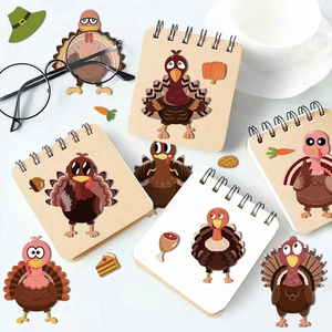 Autocollants dindon de Thanksgiving sur un carnet à spirales pour décoration et DIY