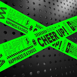 Close-up of neon green decorative tape with motivational text and smiley icons