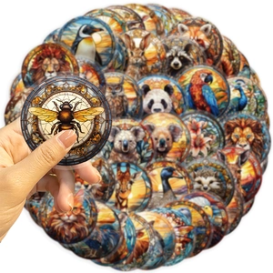 Detail of waterproof PET stickers with colorful stained glass animal art designs