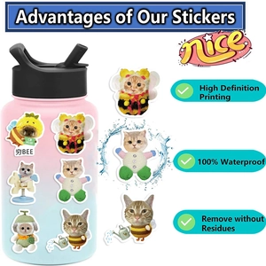 Waterproof cartoon cat stickers on a water bottle showing durable and adhesive quality