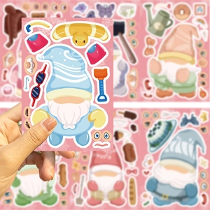 Detail of cute DIY gnome stickers with blue striped hat and red glasses for scrapbooking