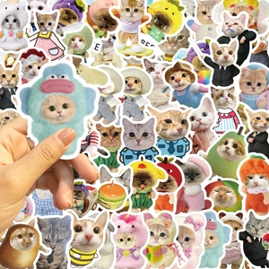 Close-up of funny cartoon cat meme stickers with various cosplay designs for decoration
