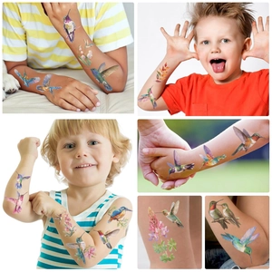 Tatuaggi temporanei colorati a acquerello con colibrì per bambini e feste su pelle