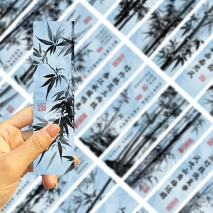 Handheld vintage Chinese ink bamboo paper bookmark with calligraphy and red seal