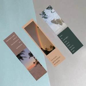 Detailed view of paper bookmarks with beach sunset, rainbow, and heart balloon prints