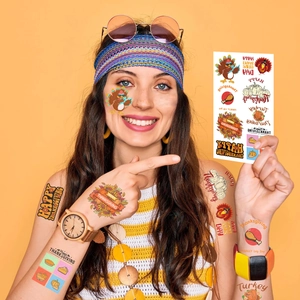 Close-up of Thanksgiving turkey and pumpkin waterproof temporary tattoos on a model