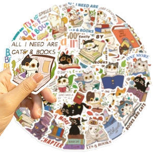 Detailed macro view of high-quality waterproof PVC cat and book themed stickers