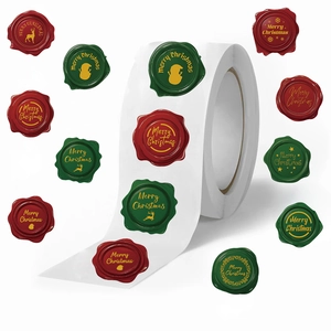Roll of red and green wax seal Christmas stickers with gold reindeer and snowman designs