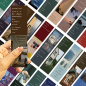 Close-up of a vintage paper bookmark featuring English poetry and a warm staircase photo