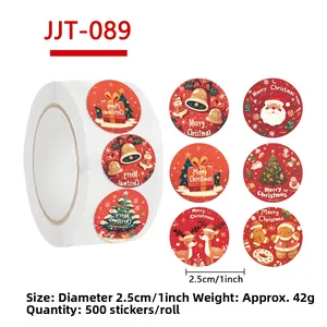 Detail of 500 Merry Christmas stickers roll featuring Santa, snowman, and reindeer motifs