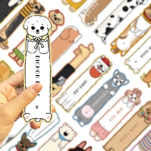 Close-up of cute cartoon Bichon Frise bookmarks with creative dog illustrations