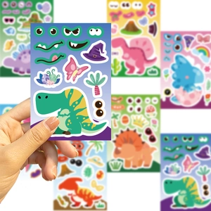 Close-up of DIY dinosaur make-a-face stickers showing colorful cartoon animal decals