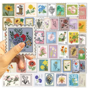 Vue détaillée d'autocollants timbres en PET transparent avec motifs de fleurs et plantes