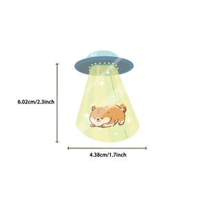 Detailed size view of cartoon UFO and Shiba Inu sticker measuring 6.02cm by 4.38cm