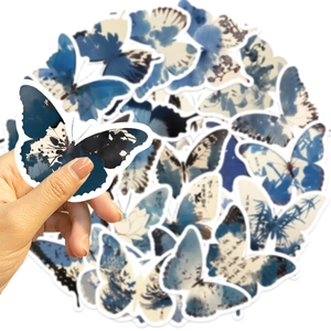 Detalle de pegatinas de mariposas de tinta vintage con acabado mate para manualidades