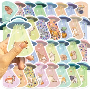 Detailed close-up of colorful cartoon UFO abduction stickers featuring cute animals and pets