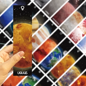 Close-up of Venus planet bookmark with artistic watercolor texture and astronomical symbols