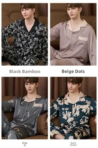 Detail showing four premium silk-like men's pajama sets with distinct prints on a sofa