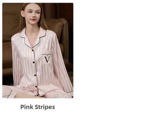 Detailed view of pink striped silk pajamas with black piping and embroidered pocket