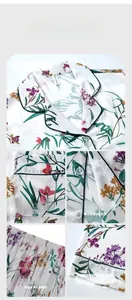 Detail of floral women's pajama set showing elastic waist, lapel collar, and neat stitching